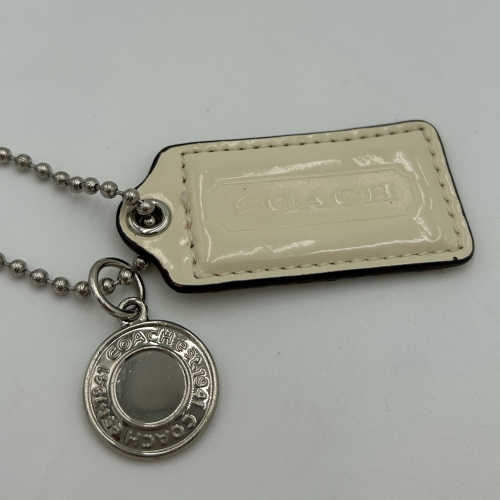 Coach Cream and Silver Disc Purse Charm Tag - Picture 2 of 3